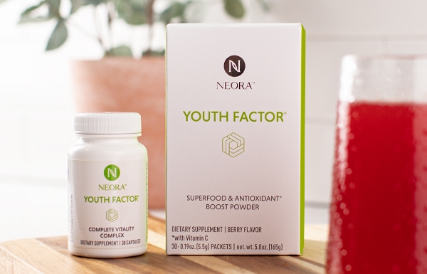 Lifestyle shot of Youth Factor® Combo Pack sitting on a wooden table.